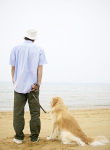 Man on Beach with Dog